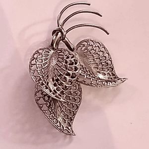 Feminine Silver-Tone Brooch Curled Filigree Leaves Knotted At Stem